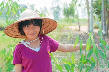 Asian cute girl in farmの写真素材