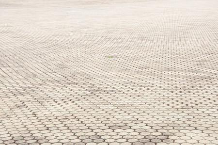 patterned paving tiles, cement brick floor の写真素材