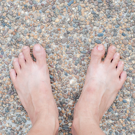 bare feet on floor backgroundの写真素材