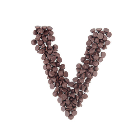 Alphabet from chocolate chips on white backgroundの写真素材