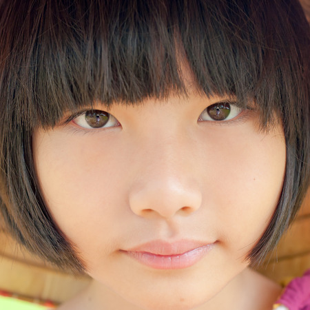 Asian cute little girl in farmの写真素材