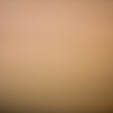 brown background from blurred lenseの写真素材