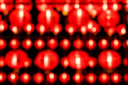 A blurred shot of red Chinese lanterns use a Seamless.の写真素材