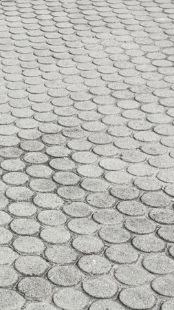 patterned paving tiles, cement brick floor backgroundの写真素材