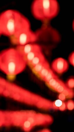 A blurred shot of red Chinese lanterns use as Seamless.の写真素材