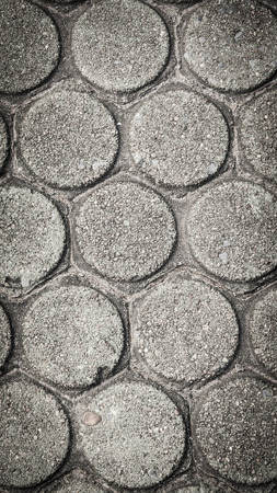 patterned paving tiles, cement brick floor backgroundの写真素材