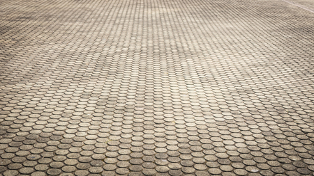 patterned paving tiles, cement brick floor backgroundの写真素材
