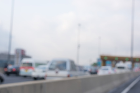 photo of blurred traffic and city backgroundの写真素材