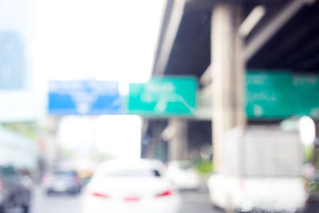 photo of blurred traffic and city background