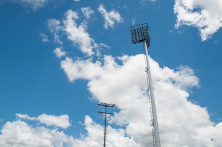 Light stadium or Sports lighting against blue skyの写真素材