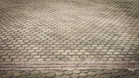 patterned paving tiles, cement brick floor backgroundの写真素材