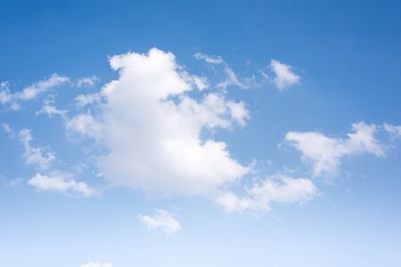 Blank sky surface with small cloudsの写真素材