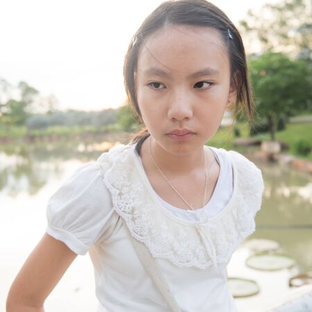 Asian girl lonely in the garden