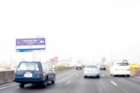 photo of blurred traffic and city backgroundの写真素材