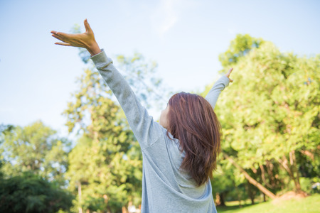 Young lady relax in natural gardenの写真素材