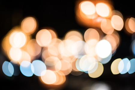 Blurred of city at night with bokehの写真素材