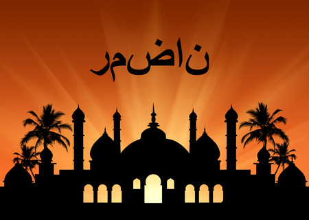 Concept of the Islamic religion. Silhouette of the town hall at sunset in the rays of lightの写真素材