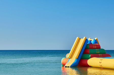 Water inflatable slide attraction. recreation concept on the waterの写真素材