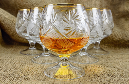 Aged whiskey in a crystal glass. design elementの写真素材