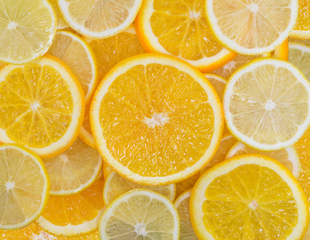 Fruit mix of lemon and orange fruit texture close-upの写真素材