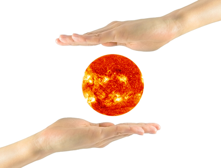 Concept of alternative solar energy. Sun in a man's hands NASAの写真素材