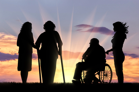 Silhouette of two people with disabilities and peepers. Caring for a disabled man in a wheelchair and a woman on crutches and peepersの写真素材