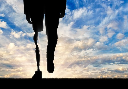 Leg with prosthesis background on sky. Concept disabledの写真素材