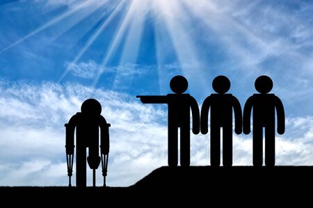 Icon disabled on crutches with prosthesis and people chase him day. Concept disabledの写真素材