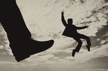 Leg big kick in man. Concept of dismissalの写真素材