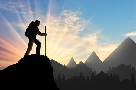 Male climber on a mountain top. Concept of mountain tourismの写真素材