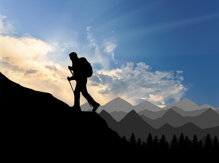 Silhouette climber ascending to the top of mountain. Concept power and motivationの写真素材