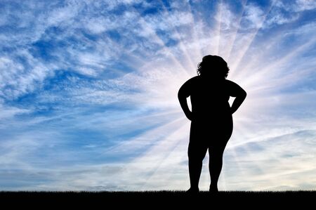 Fat woman suffering from obesity. Concept of obesityの写真素材