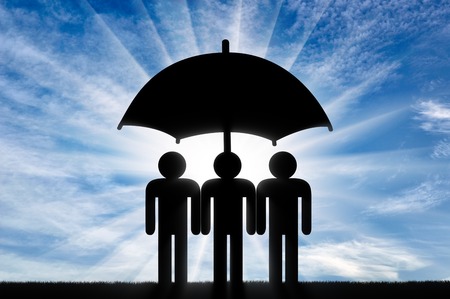 Three icons of little men stand under umbrella together. Concept of teamworkの写真素材