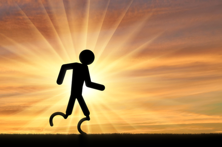 Disabled runner with a prosthetic leg. Concept of a disabled athleteの写真素材