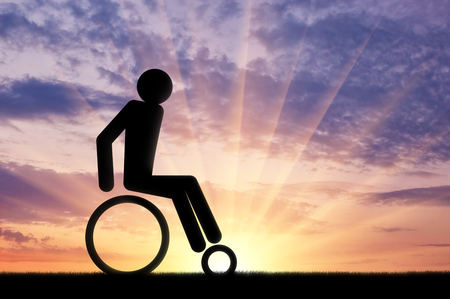 Disabled person in a wheelchair icon man. Concept of disabilityの写真素材