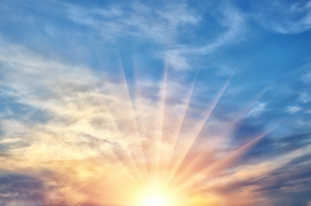 Beautiful evening sunset with clouds and sun raysの写真素材