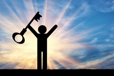 Flat icon man holds the key. Concept of accessの写真素材
