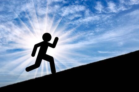Flat icon of running man on sunset background, up on slope. Concept of sportsの写真素材