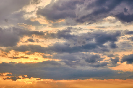 Beautiful evening sunset with cloudsの写真素材