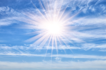 Beautiful cloudy sky with a sun in the afternoonの写真素材