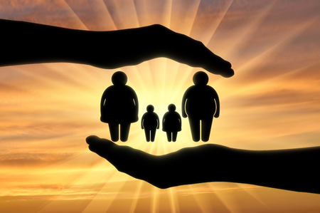 Help fat people. Fat family in the hands of manの写真素材