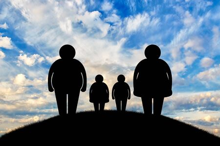 Obesity family concept. Fat family at sunsetの写真素材