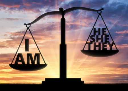 Selfish and egoist concept. Words on the scales of justice are weighted to show the concept of selfishnessの写真素材