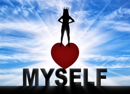 Concept of narcissism and selfishness. Silhouette of a narcissistic woman with a crown on her head.の写真素材