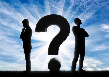 The concept of the solution of tasks and problems in the business. Silhouette thinking managers next to the question markの写真素材