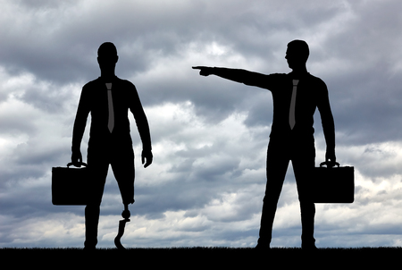 Employer refuses the invalid with a leg prosthesis to employ him for work. The concept of discrimination and inequality for people with disabilities in employmentの写真素材