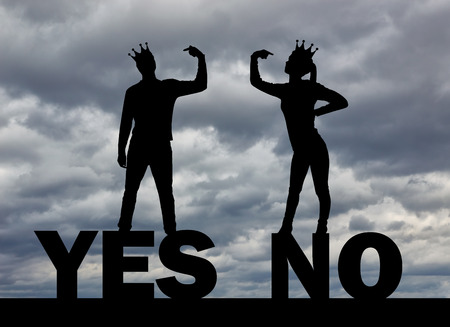 Silhouette of selfish people with crowns on their heads, prove their rightness by pointing to themselves with a finger. Conceptual scene of selfishnessの写真素材