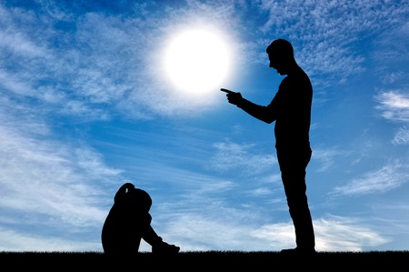 The little girl is crying and her dad yelling at her. The concept of child abuseの写真素材