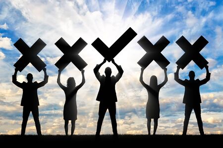 Hiring process concept. Group of people are candidates for the position. The man holds the sign...