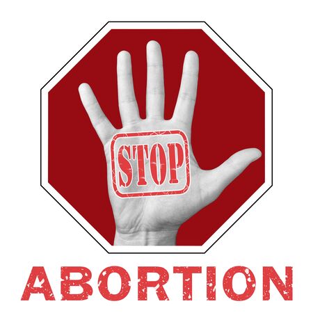 Stop abortion conceptual illustration. Open hand with the text stop abortion. Global social problemの写真素材
